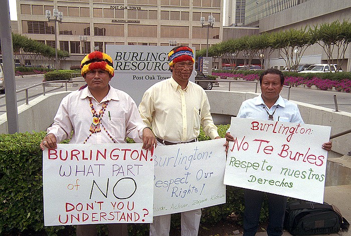 Presidents of the Amazon Federations of Ecuador and supporters held a press conference/demonstration outside the Galleria offices of Burlington Resources to reject officially any oil exploration or development activity in the Block 24 area of the Ecuadorian Amazon. Pablo Tsere, Prsident of FICSH (Shuar), Milton Callera, President of FINAE (Achuar), and Bosco Najamdey, President of FIPSE (Shuar), outside the Burlington Resources office complex.