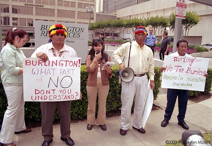 Presidents of the Amazon Federations of Ecuador and supporters held a press conference/demonstration outside the Galleria offices of Burlington Resources to reject officially any oil exploration or development activity in the Block 24 area of the Ecuadorian Amazon. Pablo Tsere, Prsident of FICSH (Shuar), Atossa Soltani of Amazon Watch (NGO), Milton Callera, President of FINAE (Achuar), and Bosco Najamdey, President of FIPSE (Shuar), outside the Burlington Resources office complex.
