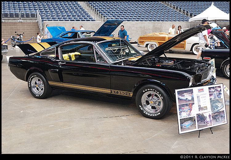 One of the original Hertz Shelby GT350H Rent-a-Racers.  There were a thousand of these, available only through the Hertz Sports Club ... if you were over 25 and had the green you could go rent yourself a genuine no-kidding bat out of hell racer for a day or a week.  I understand a lot of them went out over weekends and came back with fittings for roll bars and 5-point harnesses.